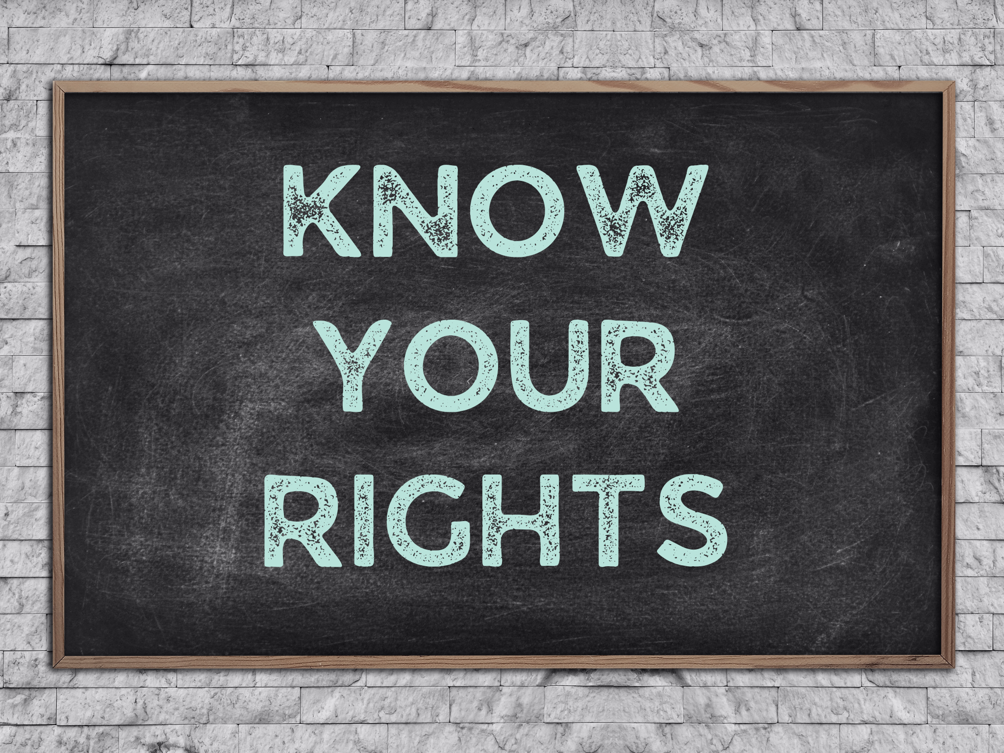 chalkboard with the words "know your rights" written on it