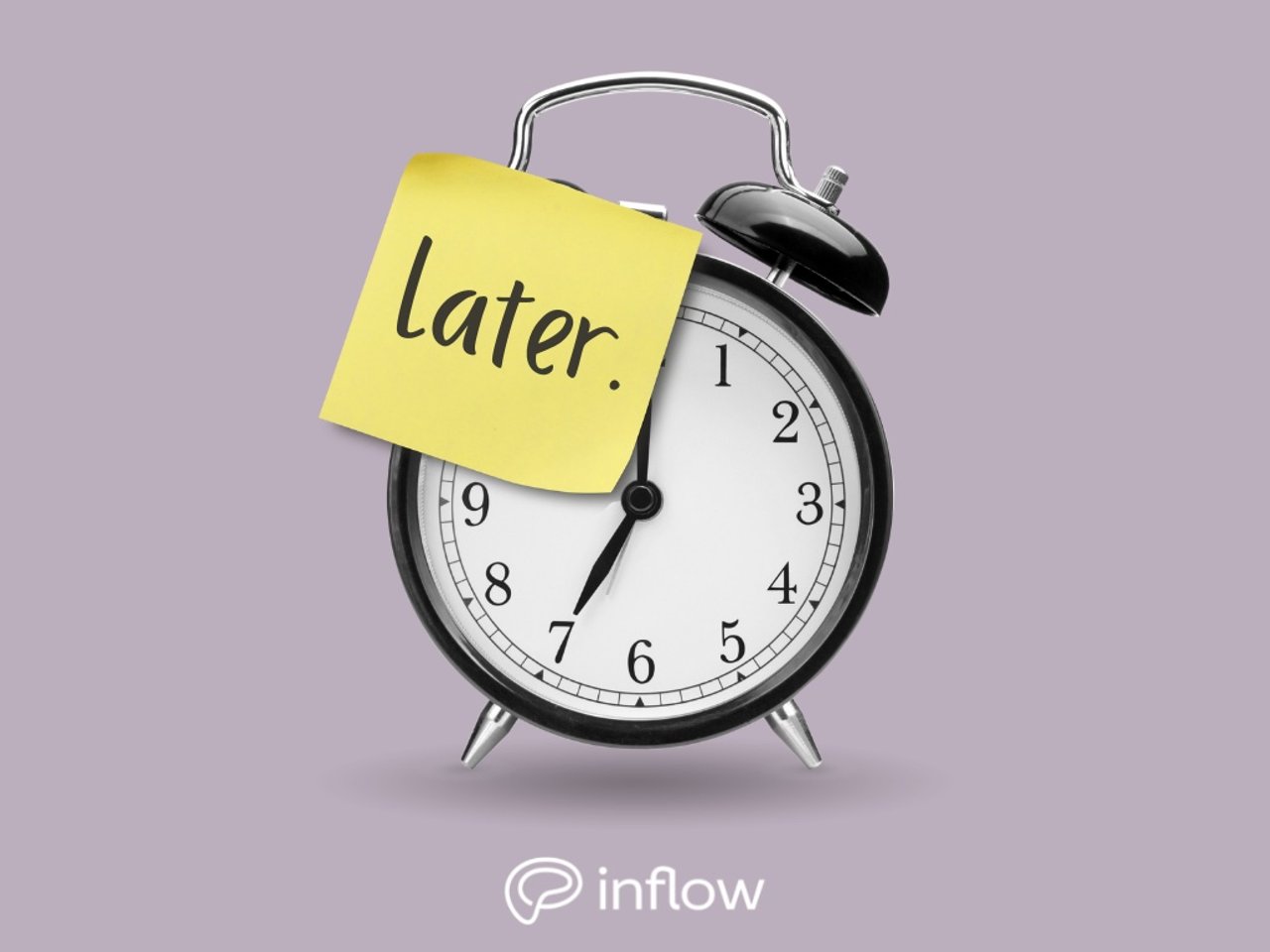 Clock with a sticky note saying "later"