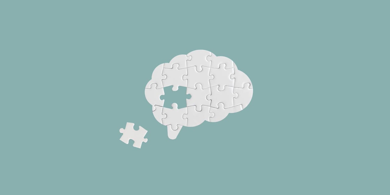 brain-shaped puzzle with one puzzle piece missing off to the side. A doctor stands next to the puzzle, shrugging. Inflow ADHD app logo is at the bottom.