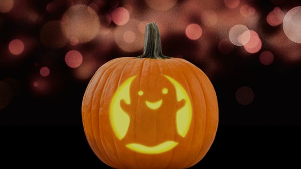 'Involuntary ghosting' is the disappearing act that happens when ADHDers forget to respond to texts, or when they ghosted their friends. Image shows a ghost carved into a pumpkin for Halloween