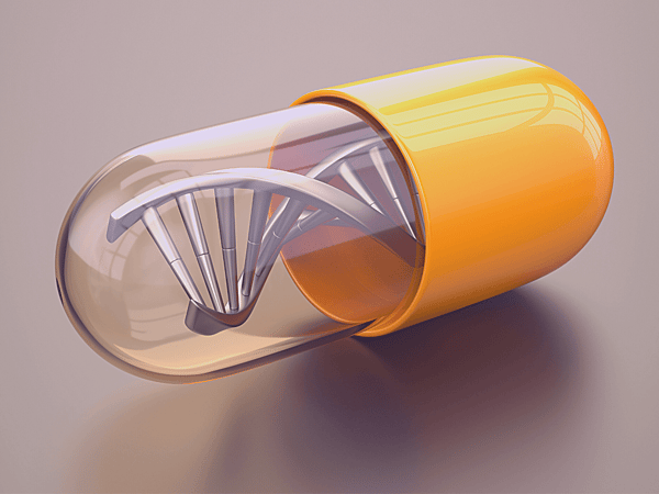 Pharmacogenetic testing and ADHD - image shows a large ADHD pill capsule with a human DNA strand inside of it