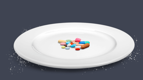 A white plate that contains nothing except for different types of ADHD pills and medication due to the stimulant effect of appetite suppression. 