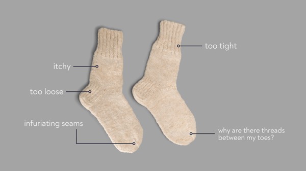 A pair of socks with labels pointing to different parts of the socks to display sensory processing disorder challenges. The text points read: too tight, itchy, infuriating seams, too loose, and why are there threads between my toes?