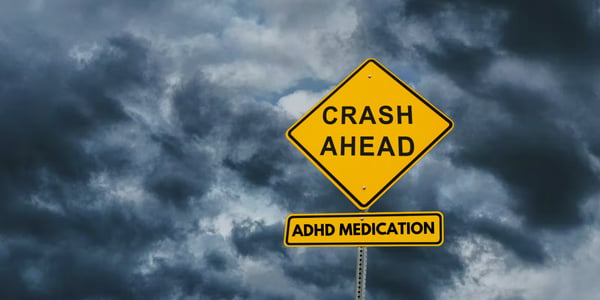 stormy background with a sign in the forefront reading "crash ahead" on a diamond shaped sign, and "adhd medication" on the rectangular sign below it. The inflow logo sits at the very bottom of the image.
