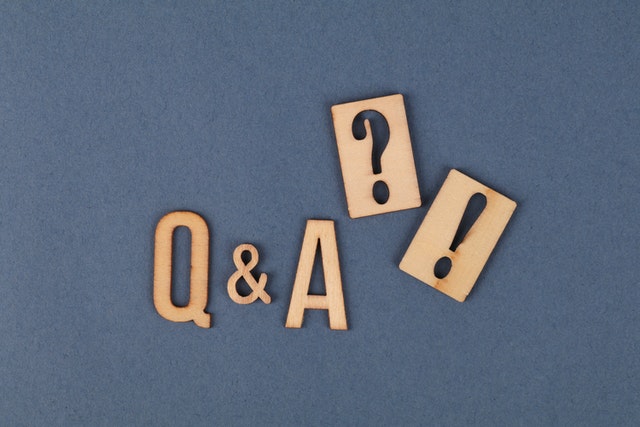 letter tiles spelling "q and a"