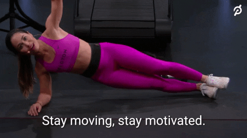 Gif of a woman in pink sportswear and gym shoes, leaning  on the floor in a side plank (resting her weight only on one underarm and her foot). She is moving her hips up and down while speaking into a microphone. The caption reads: Stay moving, stay motivated.