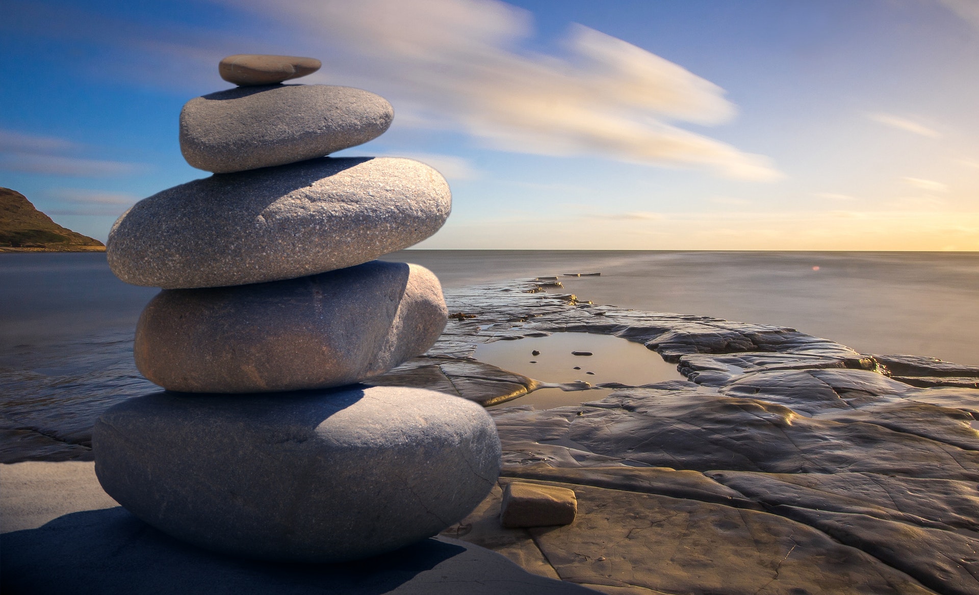 stones stacked on one another on the beach