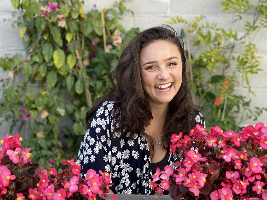 A photo of Emily T, an ADHD and accountability coach for Inflow
