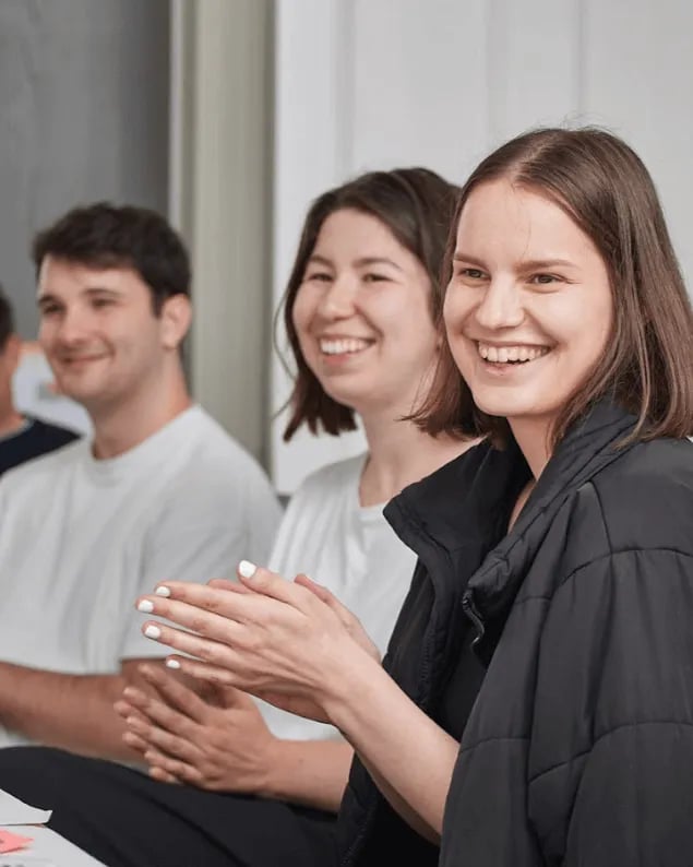 3 team members from Inflow laugh together