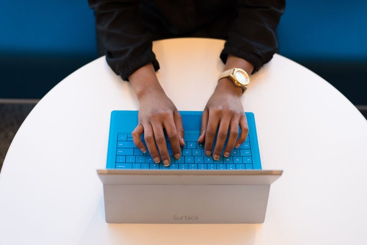 typing on a laptop